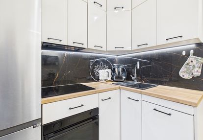 Dwa pokoje w kamienicy w centrum miasta