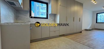 Nowoczesna kawalerka z ogródkiem na nowym mieście.