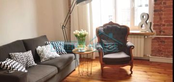 Industrialny apartament w kamienicy* centrum