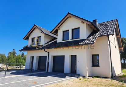 Dom w zabudowie bliźniaczej z garażem