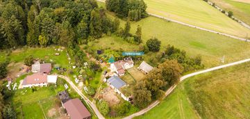 Działka siedliskowa 3 239 m² z zabudowaniami