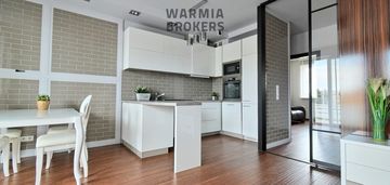 W nowym bud.przy parku, blisko centrum,garaż podz.