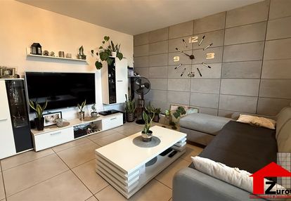 Przestronne mieszkanie z garażem i działką