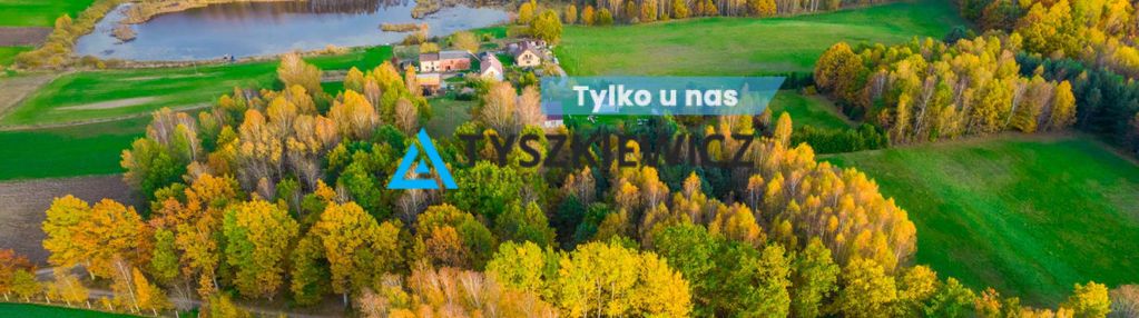 Działka położona w sąsiedztwie lasów i jeziora