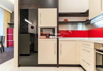 Dwa pokoje z balkonem i garażem w centrum