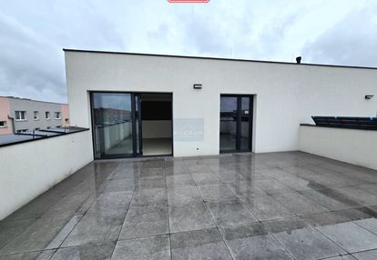 Dwupoziomowy apartament z tarasem na dachu