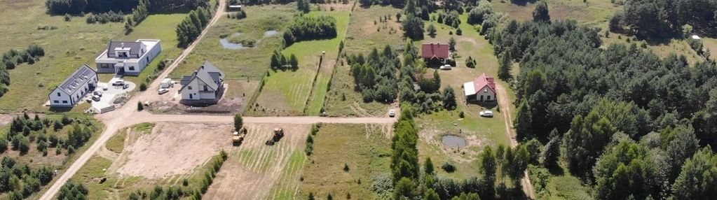 Działka przy ścianie lasu, gorczyca, płaska