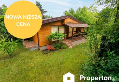 Działka z domkiem letniskowym w otoczeniu lasu