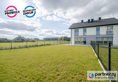 Dom z garażem na słonecznej działce kębłowo