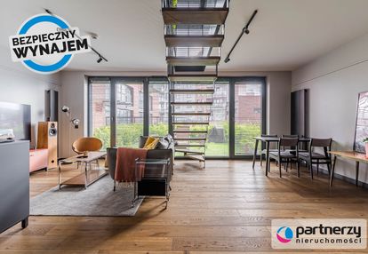 Dwupoziomowy apartament z ogrodem