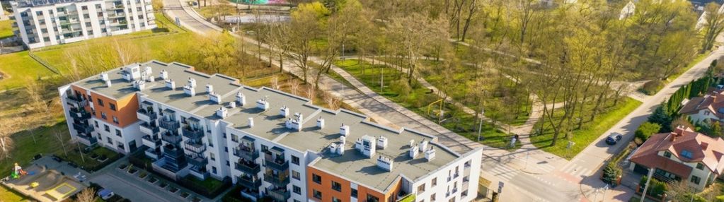 3 pokoje _ogródek_balkon_2x garaż_apartamentowiec