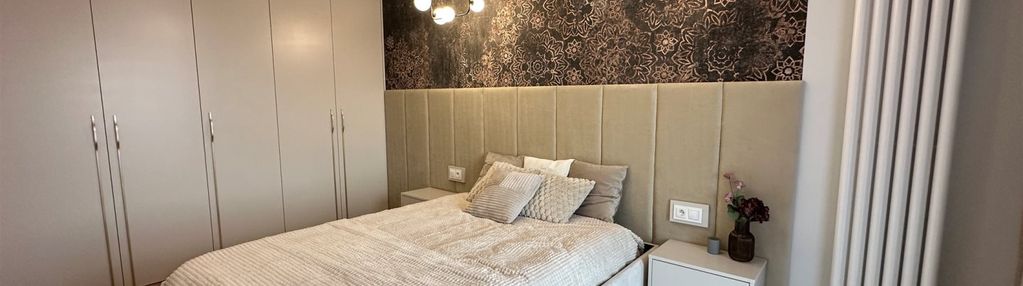 4 pokojowy apartament z 2 miejscami garażowymi.