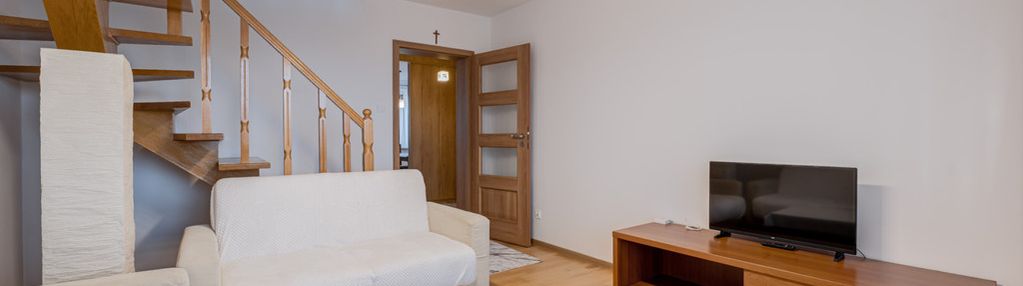 Dwupoziomowe mieszkanie z miejscem parkingowym