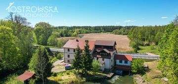 Budynek na wyspie/rzeka krutynia/po młynie wodnym