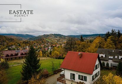 Dom inwestycyjny z widokiem na panoramę wisły.
