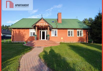 Dom z piękną działką - oaza spokoju i prywatności.