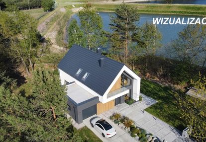 Dom jednorodzinny z poddaszem /dz. 10,5 ara /garaż