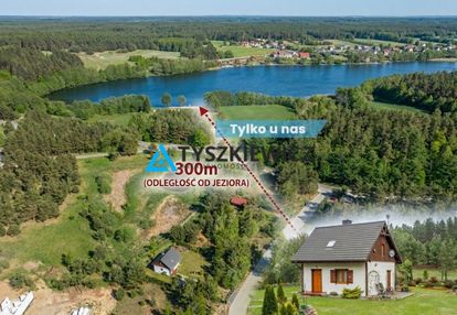Urokliwy dom, otoczony drzewami, nad j.kamieniczno