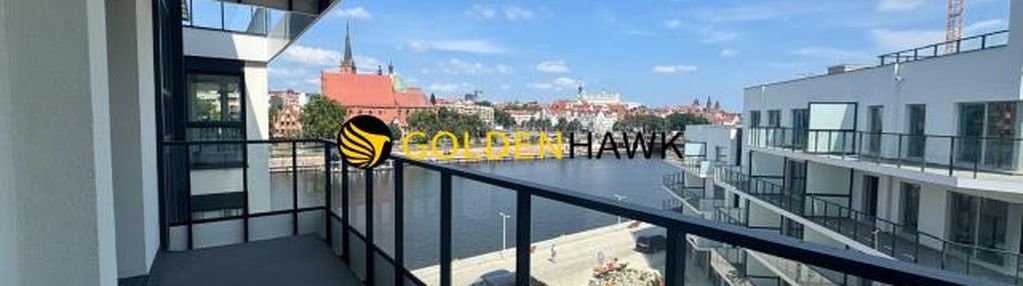 Apartament nad odrą z tarasem i widokiem na rzekę.