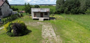 Działka z budynkiem po sklepie