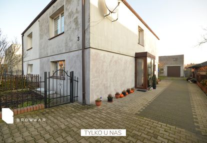 Dwie działki z domem i garażem| rokietnica centrum