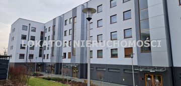 Apartament z tarasem + miejsce postojowe w hali