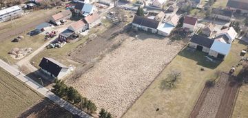 Działka inwestycyjna z zabudowaniami