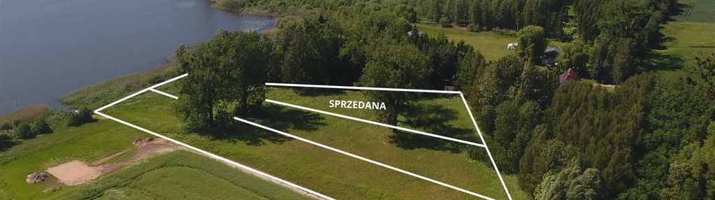 Działki z linią brzegową jeziora łabędź