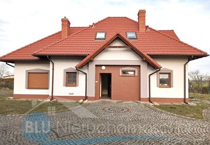 Dom z działką usługową i projektem hali