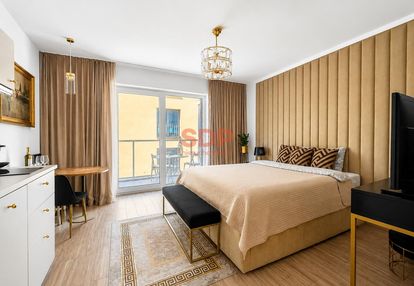 Małe mieszkanie w apartamentowcu przy rynku (przy rzece)