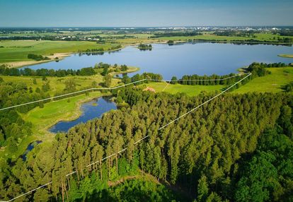 Olsztyn, dom z bala z linią brzegową