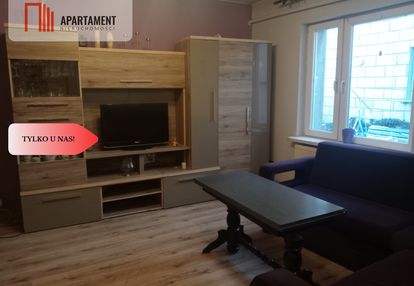 Dom z budynkiem gospodarczym.