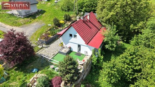 Dom na działce 6024 m² z potencjałem inwestycyjnym