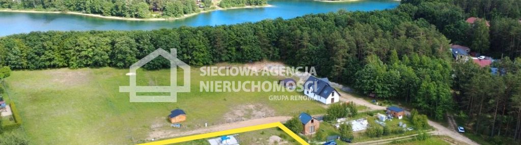 Działka z rozpoczętą budową 130 m od jeziora.