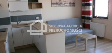 Nowoczesna kawalerka z miejscem postojowym.