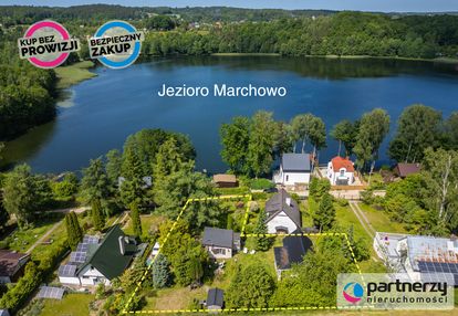 Malownicza działka z domkami nad samym jeziorem