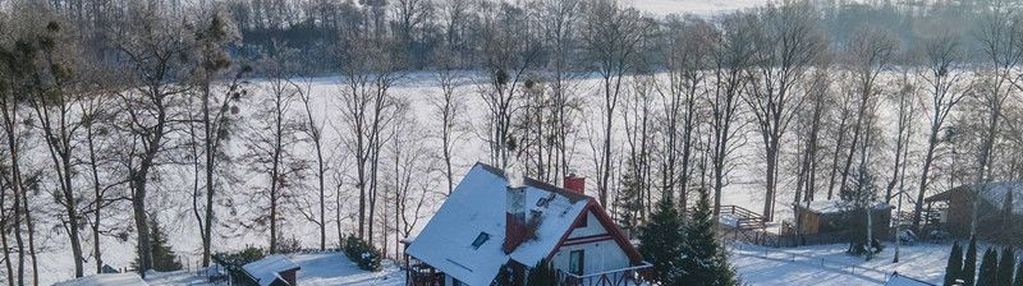 Dom z linią brzegową jez. pozorty.