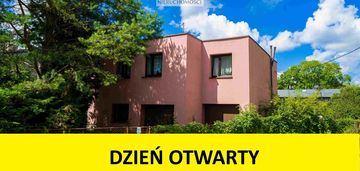 Dom wolnostojący z dwoma garażami i kanałem