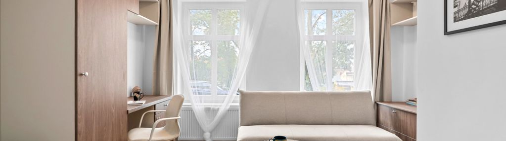 **dwa pokoje po remoncie w pięknej kamienicy**