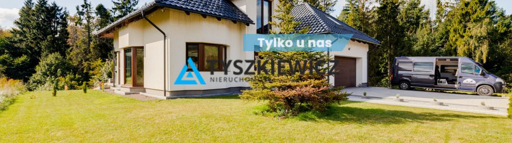 Przepiękny dom tuż przy lesie.