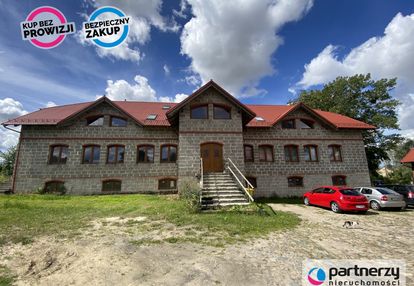 Dom z zabudowaniami gospodarczymi