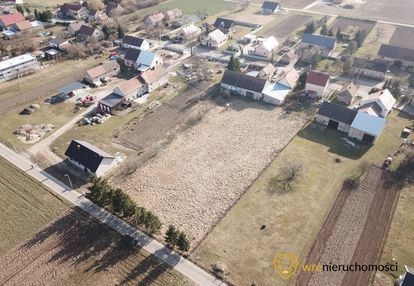 Działka inwestycyjna z zabudowaniami