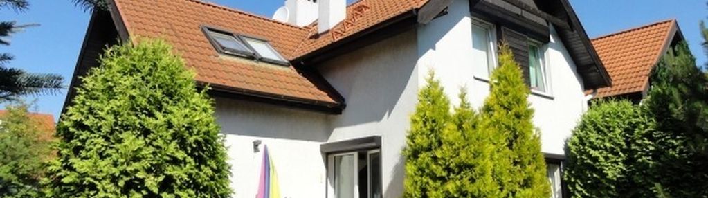 Wygodny i funkcjonalny z garażem i ogrodem