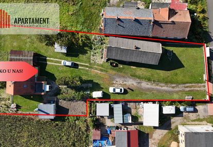 Dom 130 m² + budynek gos. 107 m² | przyczyna górna