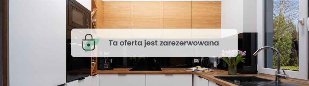 Dom z zadbanym ogrodem i wolnostojącym garażem