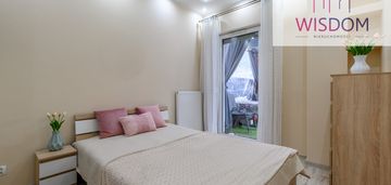 Mieszkanie z ogrodem na tęczowym lesie