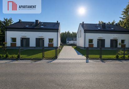 Nowoczesny dom bliźniak w trąbkach wielkich