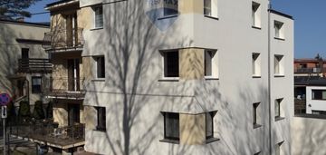 Dwupoziomowe  kamienica z parkingiem ,super