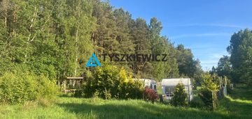 Urokliwa działka w lesie ostrowo