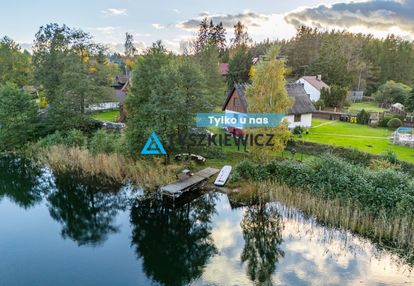 2 domy z linią brzegową jeziora i opcją wynajmu!